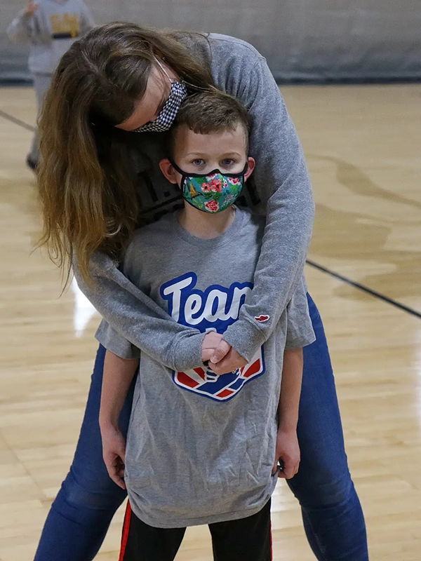 Torin and Catherine at Torin's Signing Day with the Oles